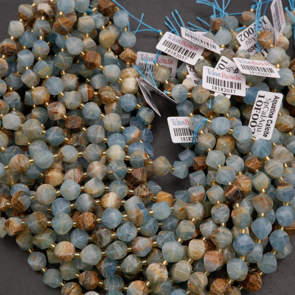 String of faceted blue and brown beads with price tags on a dark surface