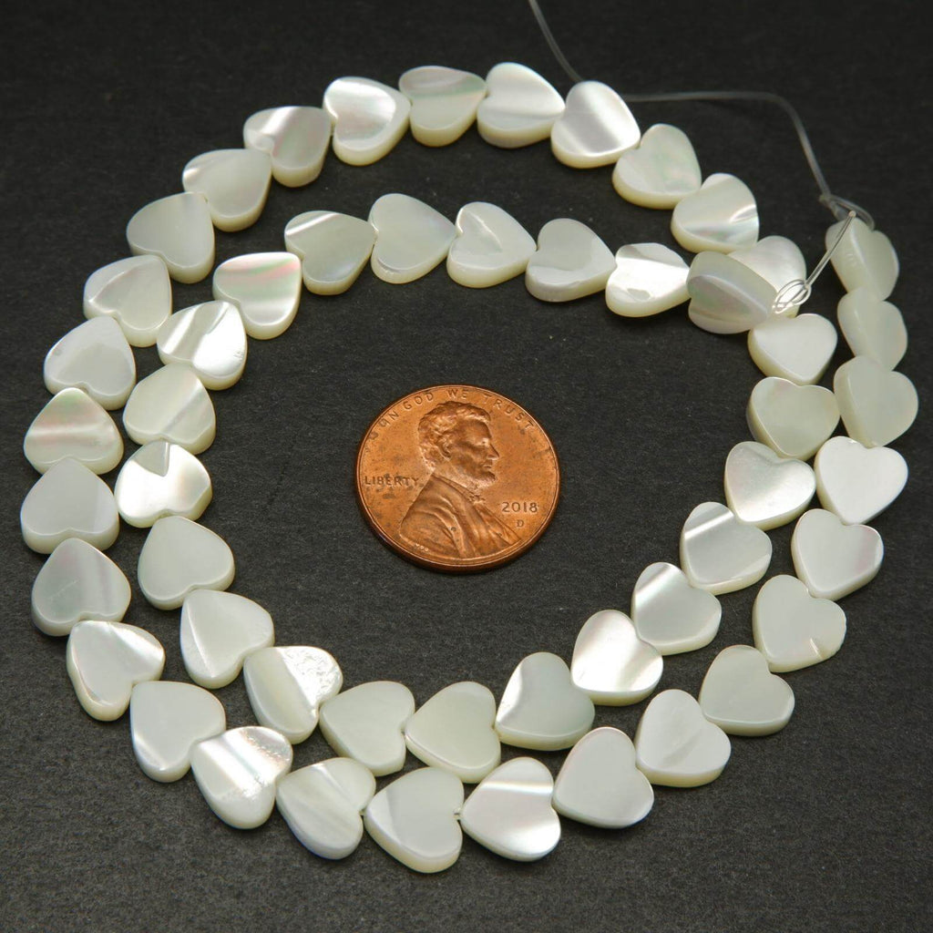 Heart shape mother pearl beads.