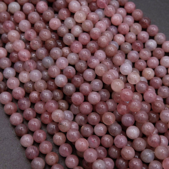 Close-up of pink pearls on a gray background