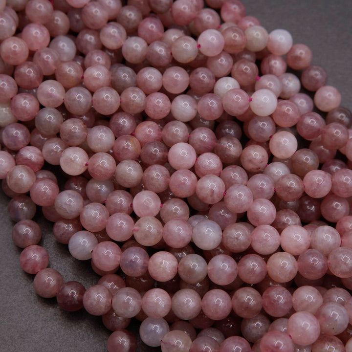 Close-up of pink beads on a gray background