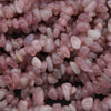 Close-up of pink stones with a dark background