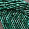 Close-up of green beads on a gray background