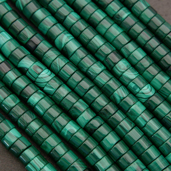 Close-up of green marbled beads arranged in a circular pattern.