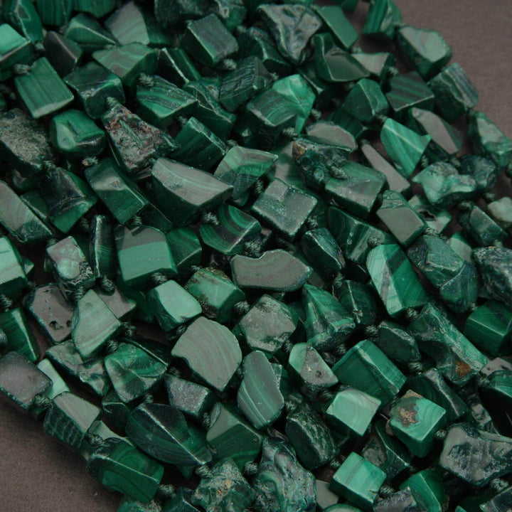 Close-up of green stone chips on a dark background