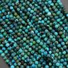Turquoise and green beads scattered on a surface