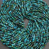 String of turquoise beads on a gray background