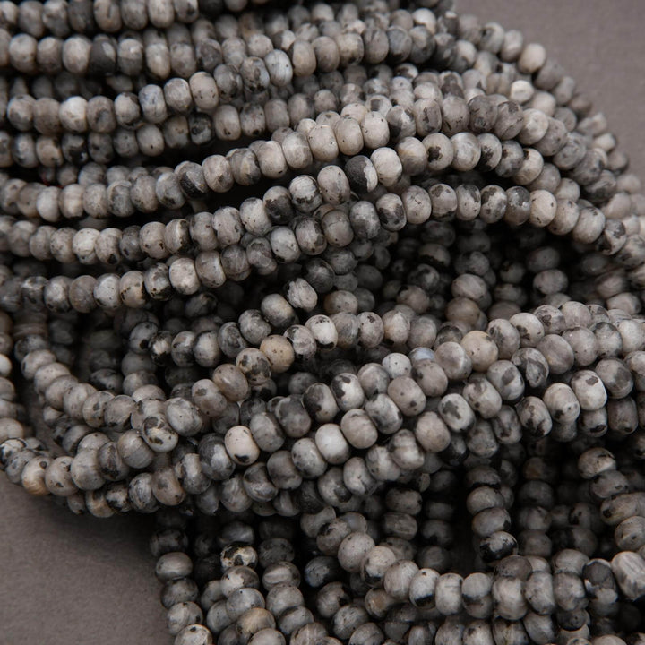 Grey larvikite beads.