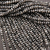 Grey larvikite beads.