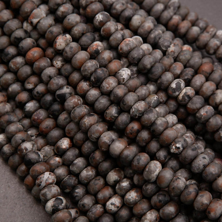 Close-up of matte Yooperlite beads showing natural mottling and inclusions