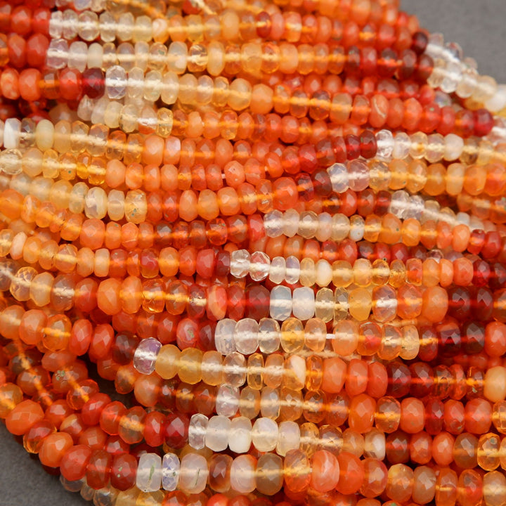 Close-up of multicolored bead strands on a gray background