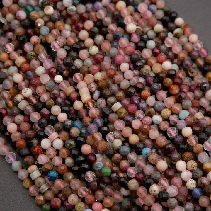 Close-up of multicolored beads on a gray background