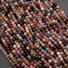 Close-up of multicolored beads on a gray background