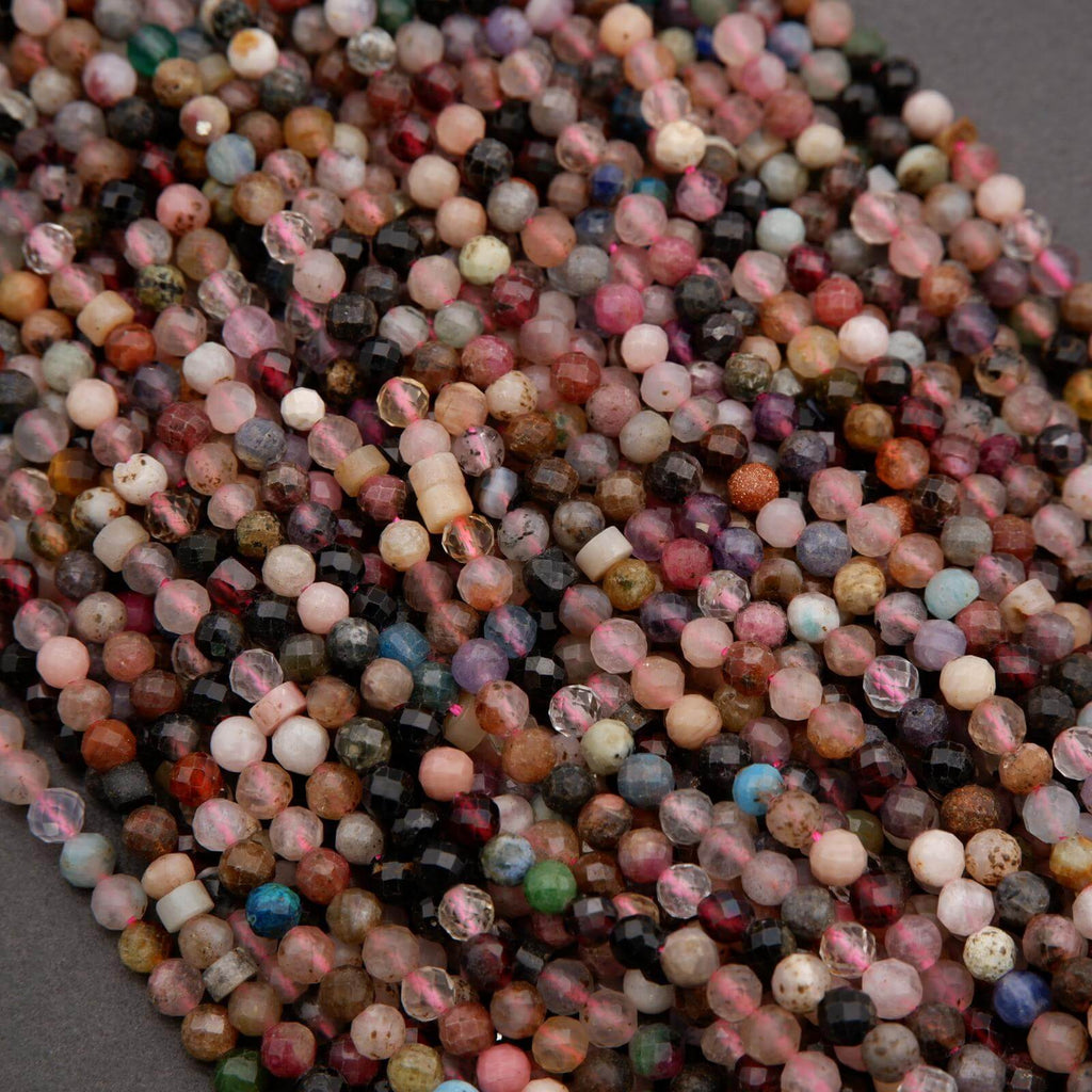 Close-up of multicolored beads on a gray background