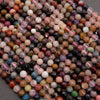 Close-up of multicolored beads on a dark background