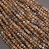 Close-up of a string of multicolored beads on a gray background
