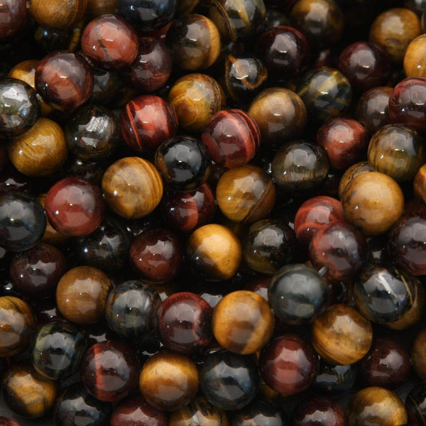 Close-up of multicolored gemstones including red, yellow, and black.