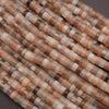 Close-up of a string of multicolored beads on a dark background