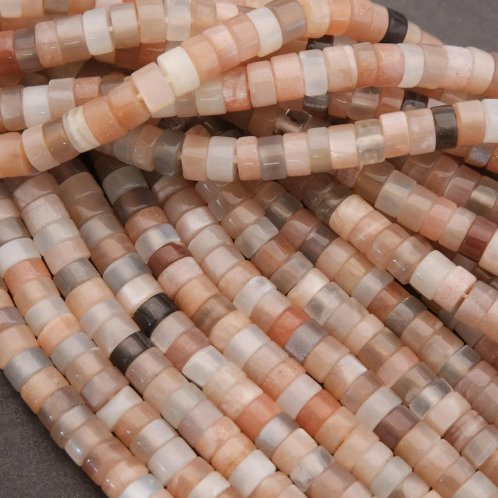 Close-up of a string of multicolored beads on a dark background