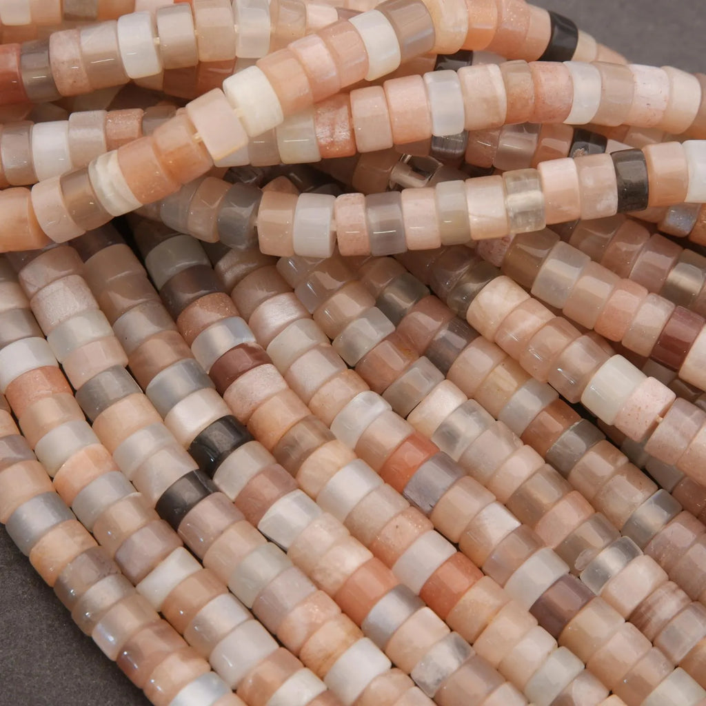 Close-up of a string of multicolored beads on a dark background