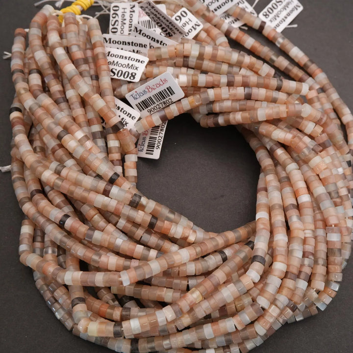 String of multicolored beads with labels on a dark background