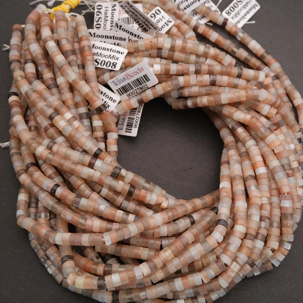 String of multicolored beads with labels on a dark background