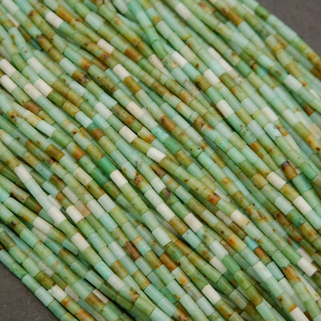 Close-up of green and white cylindrical beads