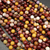 Yellow and brick red mookaite beads.