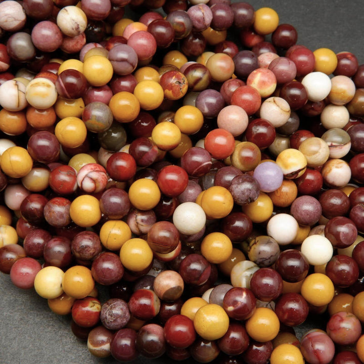 Yellow and brick red mookaite beads.