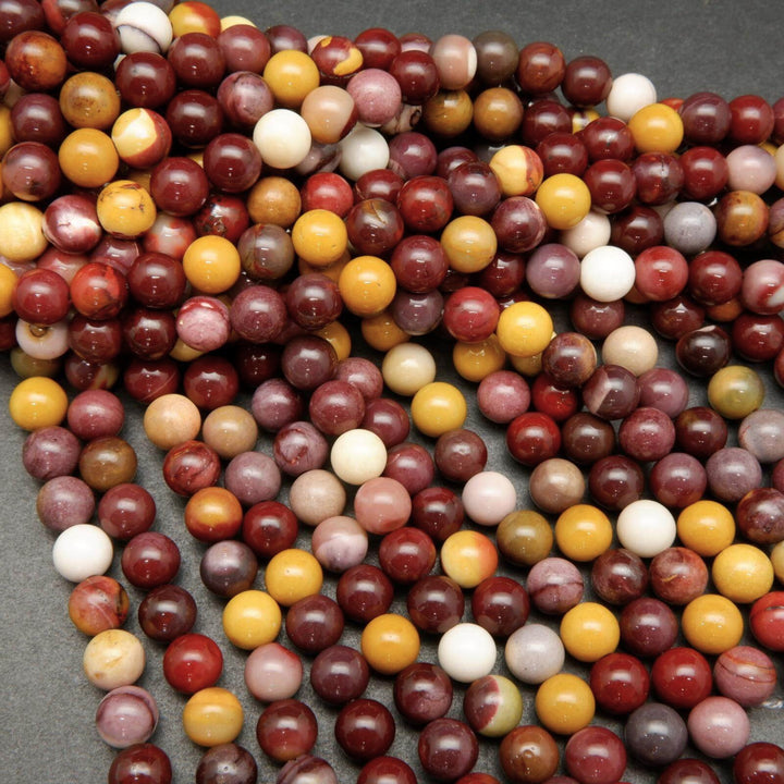 Yellow and brick red mookaite beads.