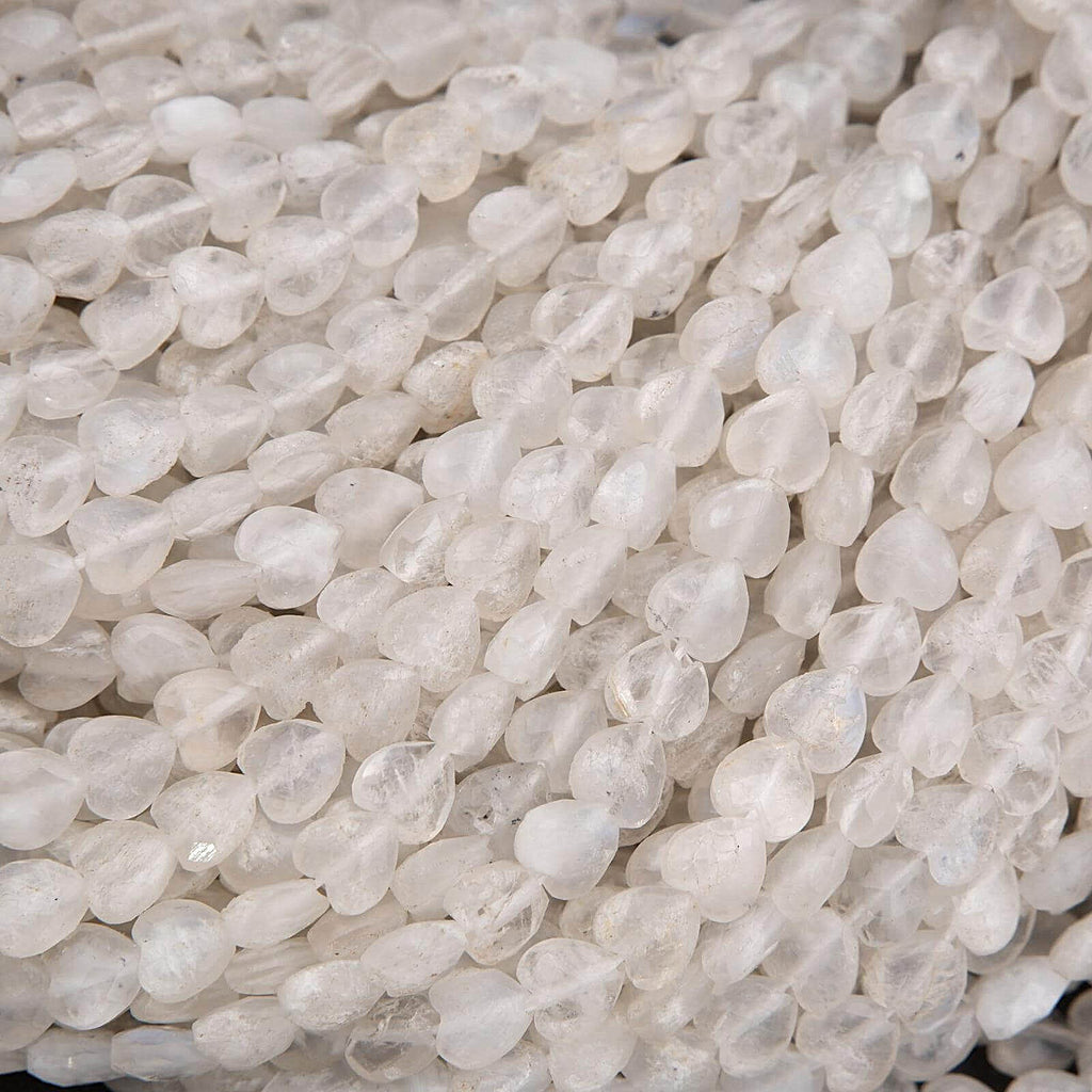Close-up of white teardrop-shaped beads.