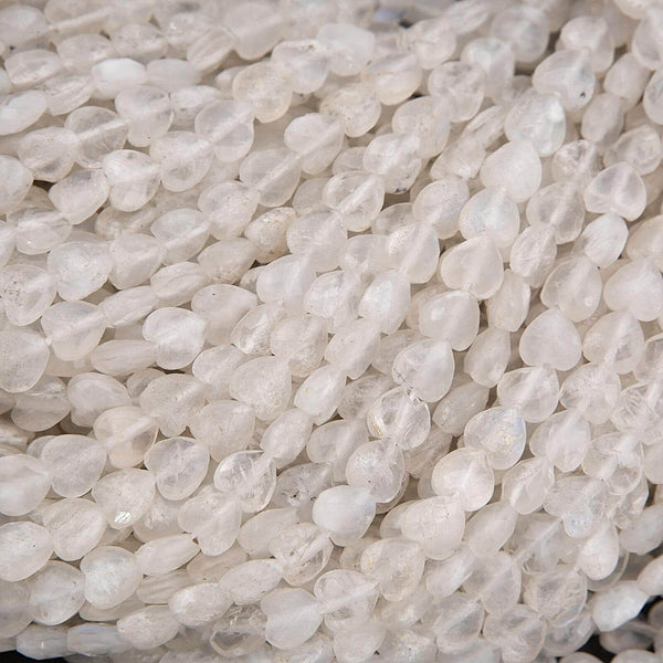 Close-up of white teardrop-shaped beads.