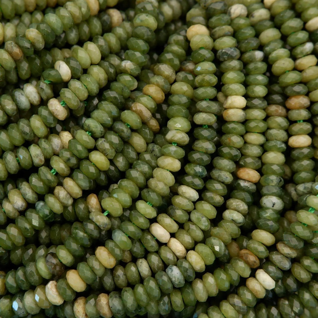 Close-up of green and brown glass beads