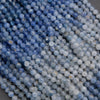 Close-up of blue and gray beads on a gray background