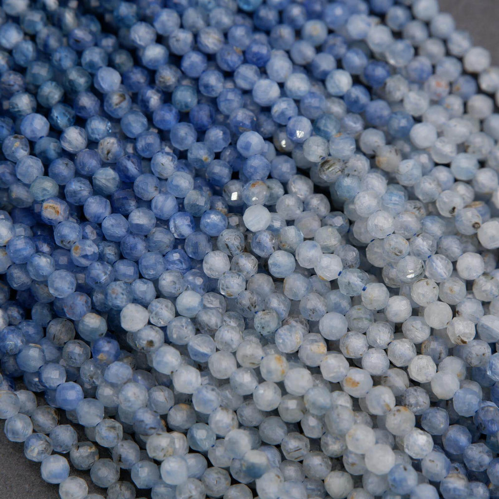 Close-up of blue and gray beads on a gray background