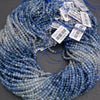 Blue beads with price tags on a gray background