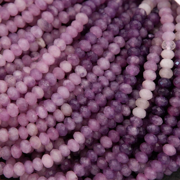Close-up of purple beads on a white background