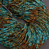 Multicolor blue and brown strands of round beads.