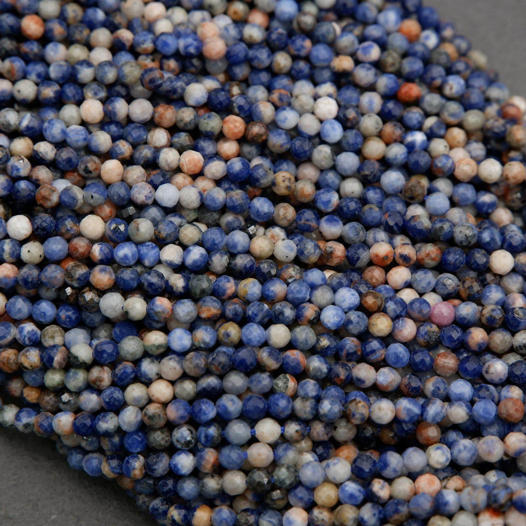 Orange, blue, and white, round faceted beads.