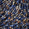 Orange, blue, and white, round faceted beads.