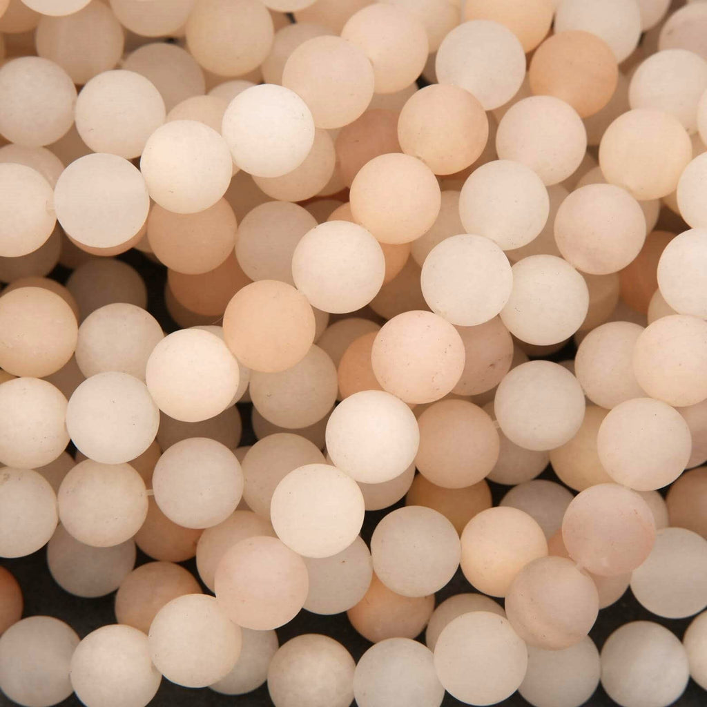 Close-up of beige and white round beads