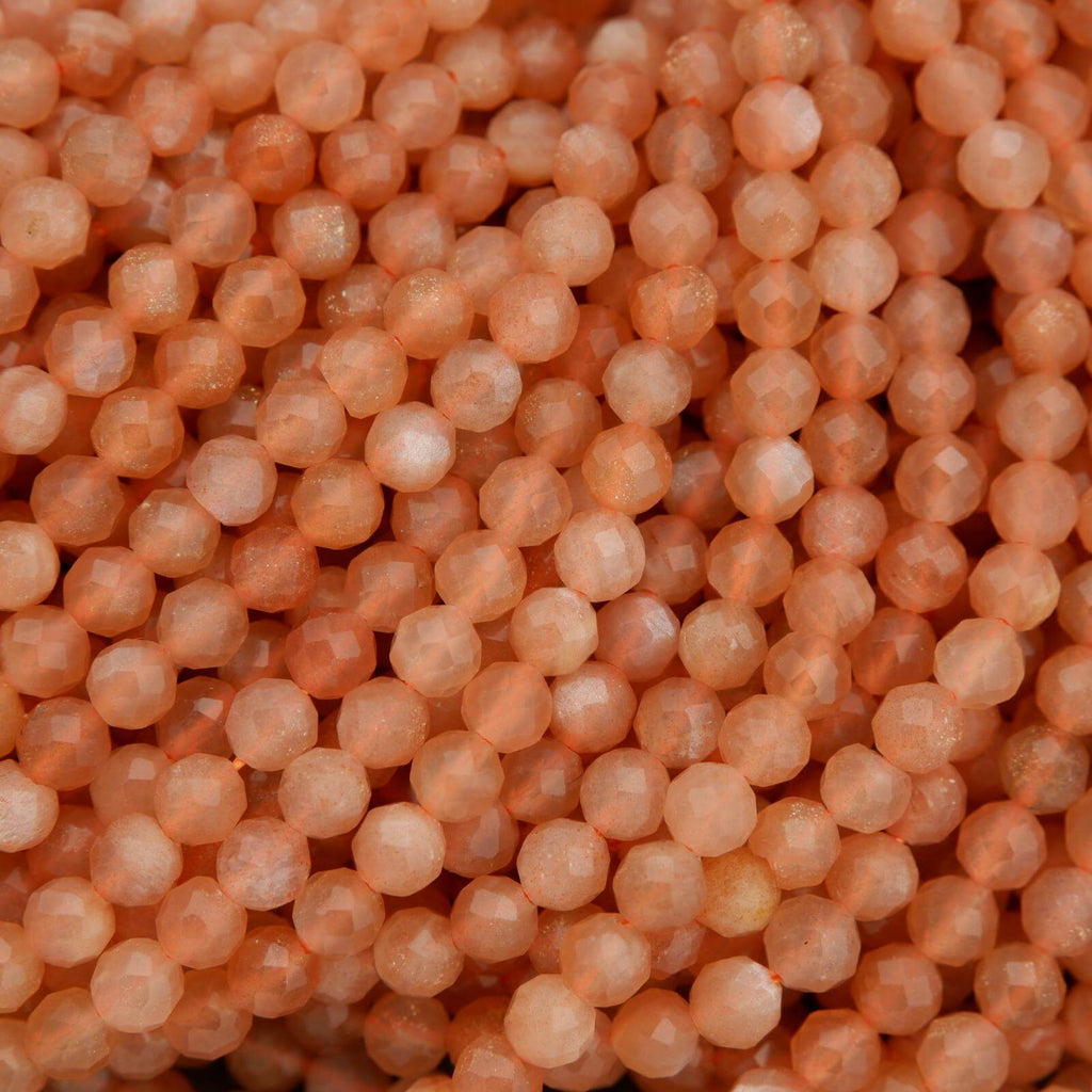 Close-up of pinkish-orange beads