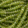 Close-up of green peridot beads.