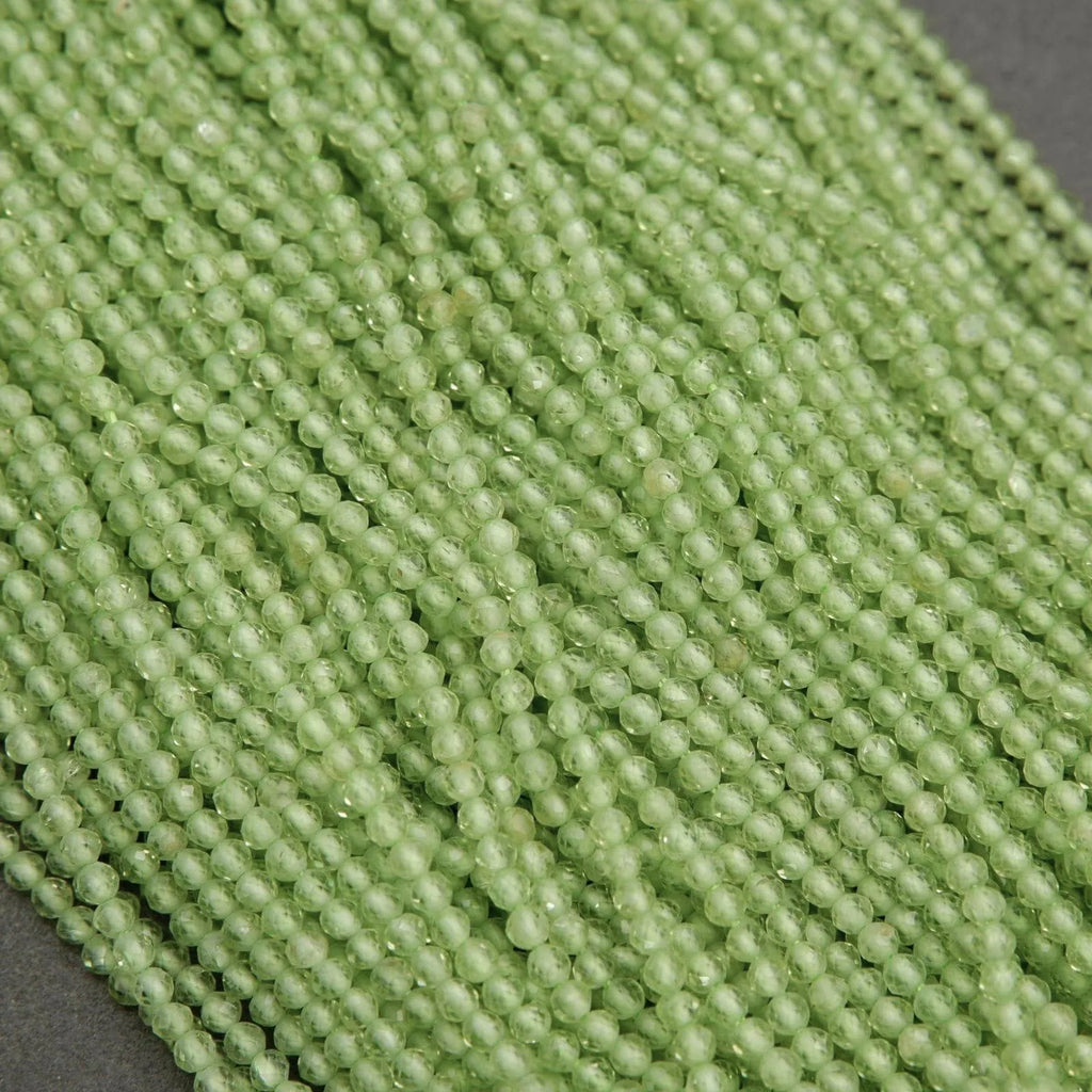Close-up of green beads on a gray background