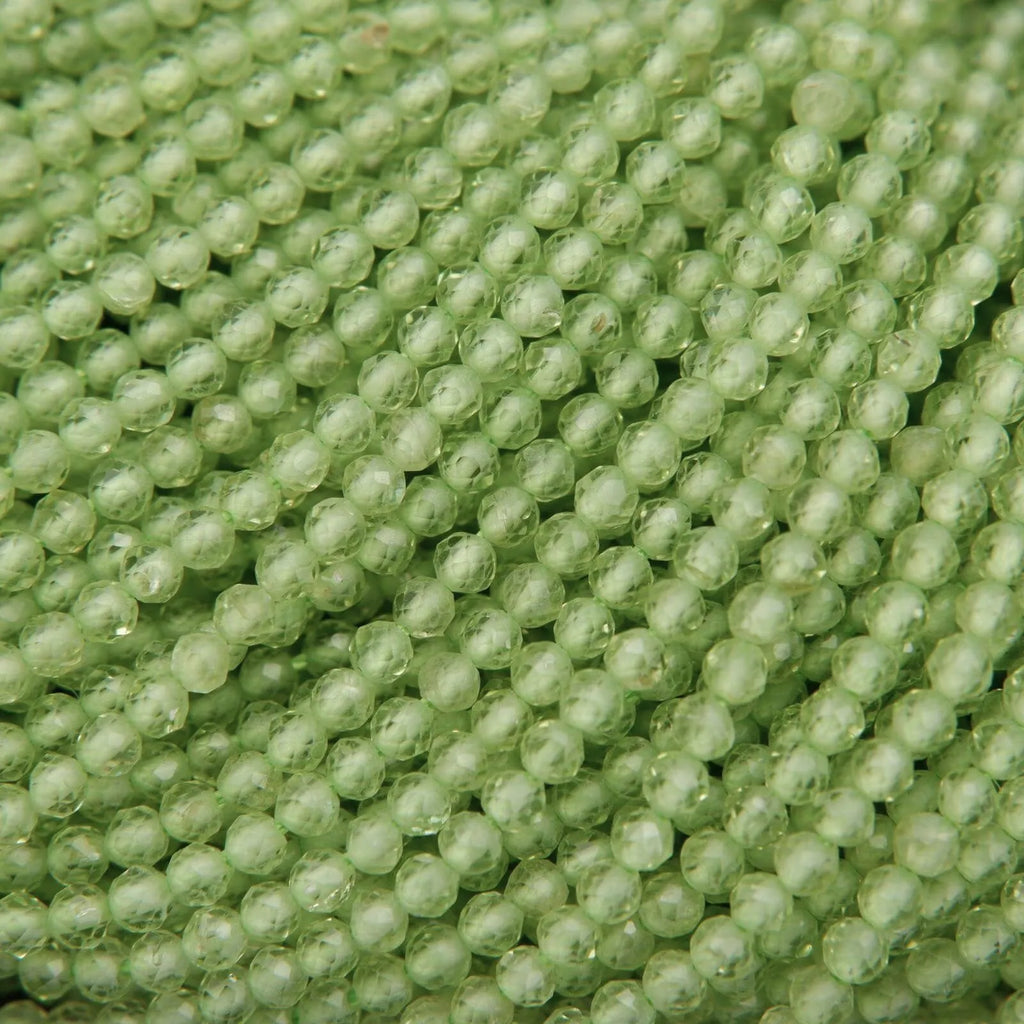 Close-up of green beads arranged in a row