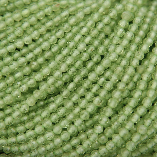 Close-up of green beads arranged in a row