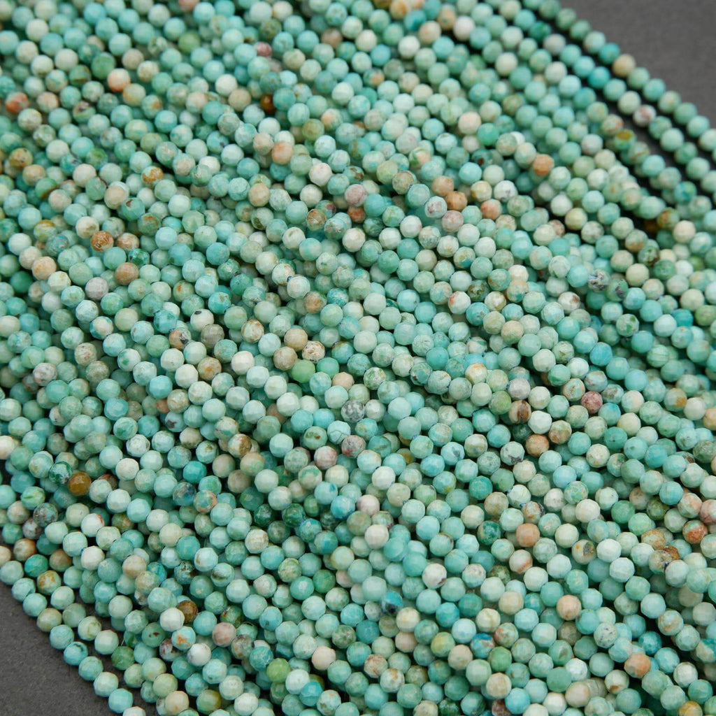 Sea green-blue faceted round beads.