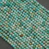 Sea green-blue faceted round beads.