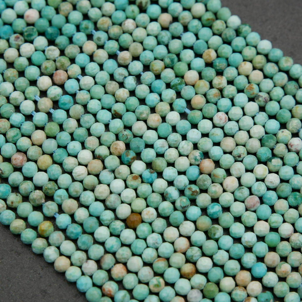 Sea green-blue faceted round beads.