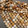 Assorted natural stone bead strands featuring round shapes and warm earth-tone palette.
