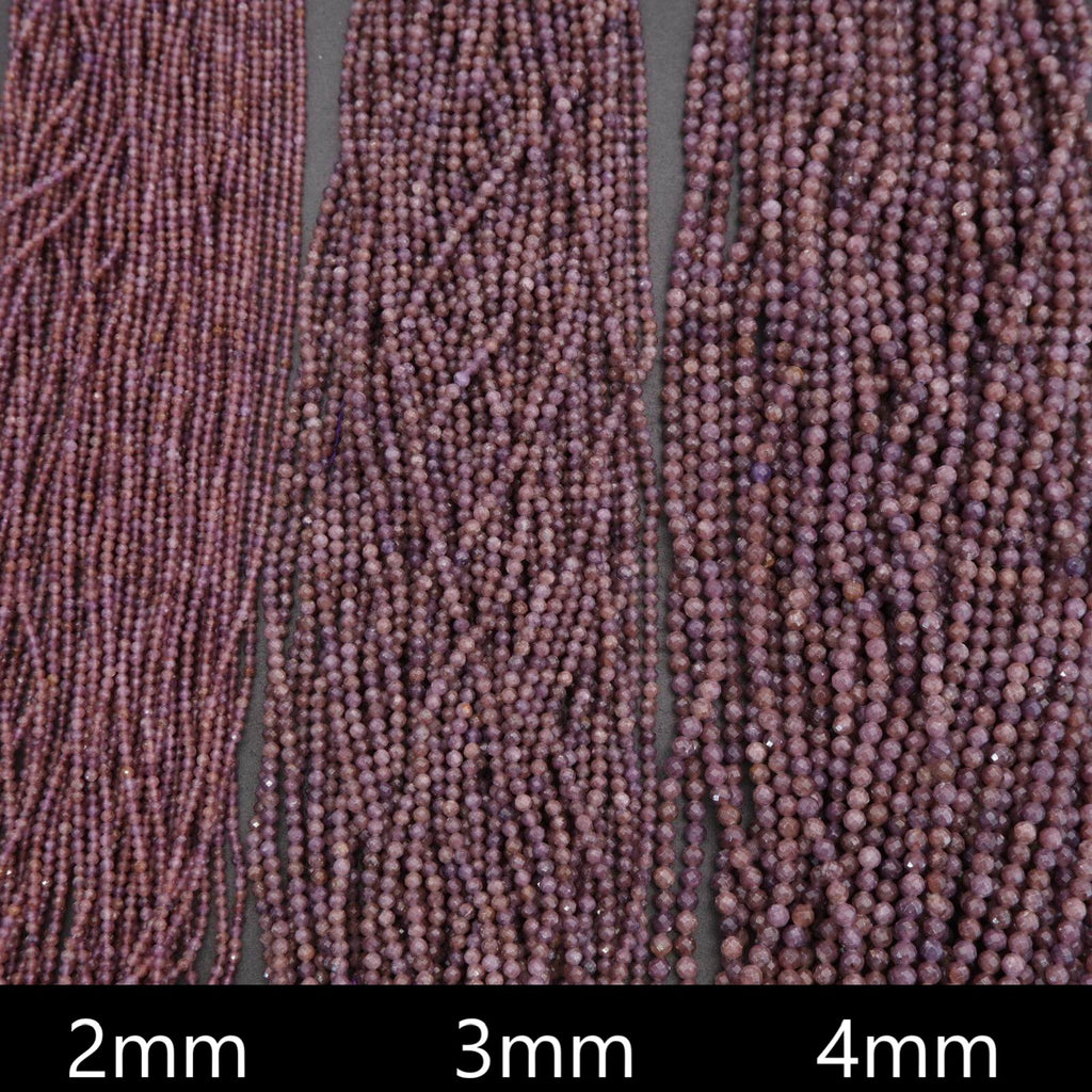Close-up of purple beads with size labels 2mm, 3mm, and 4mm on a dark background.